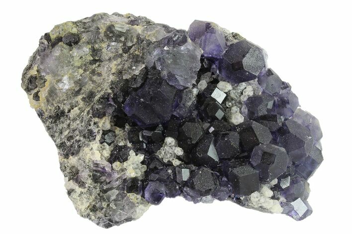 Purple Cuboctahedral Fluorite Crystals on Quartz - China #163575